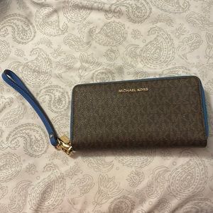 Authentic brown/blue large Michael Kors wristlet